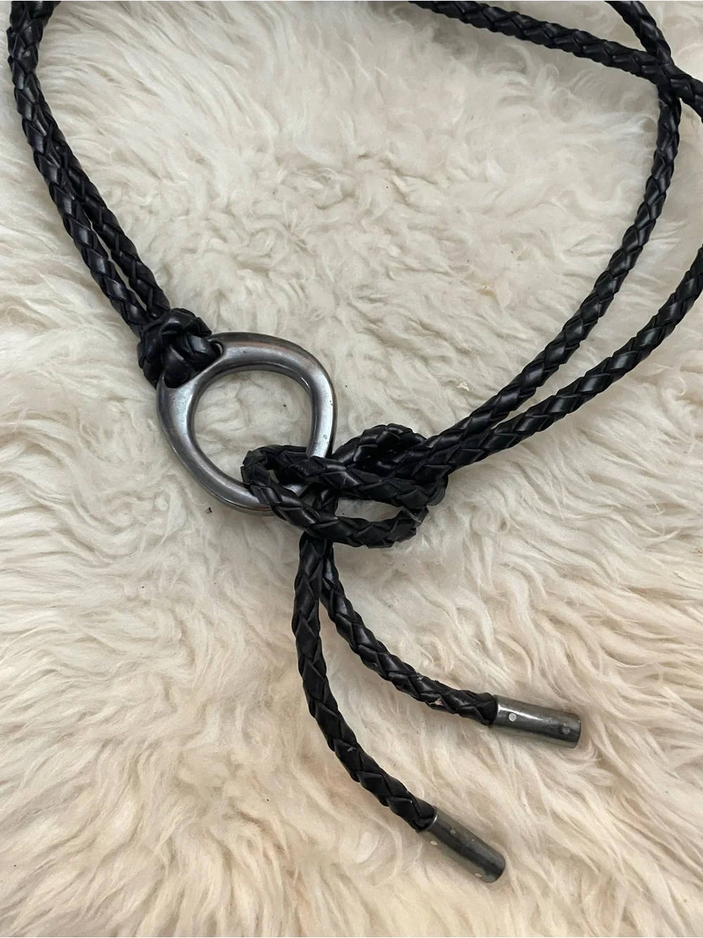 Braided black wrap around belt with a pewter ring buckle
